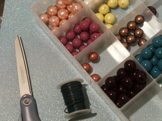 Supplies needed to make a pearl and leather lariat necklace