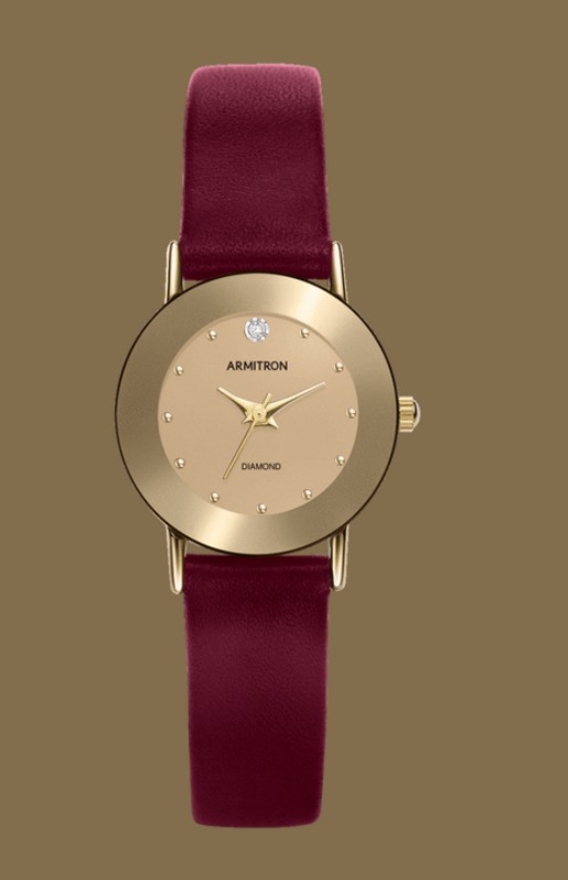 Armitron Gold plated watch with burgundy leather strap