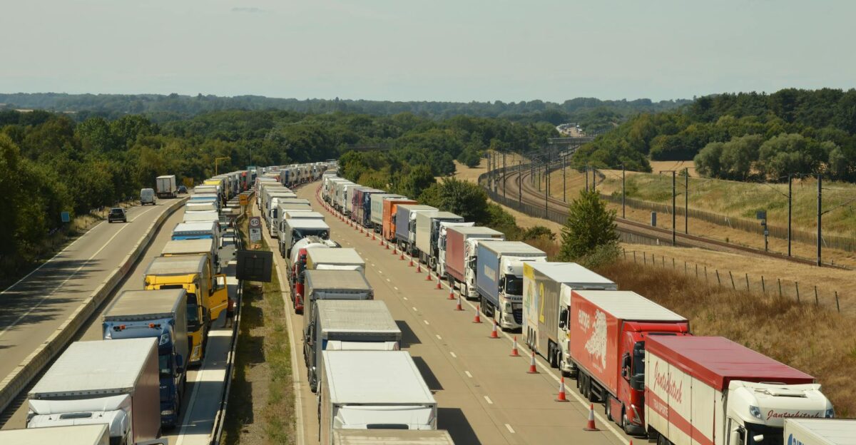 Aerial view of trucks in a traffic jam on a highway in England showcasing road congestion