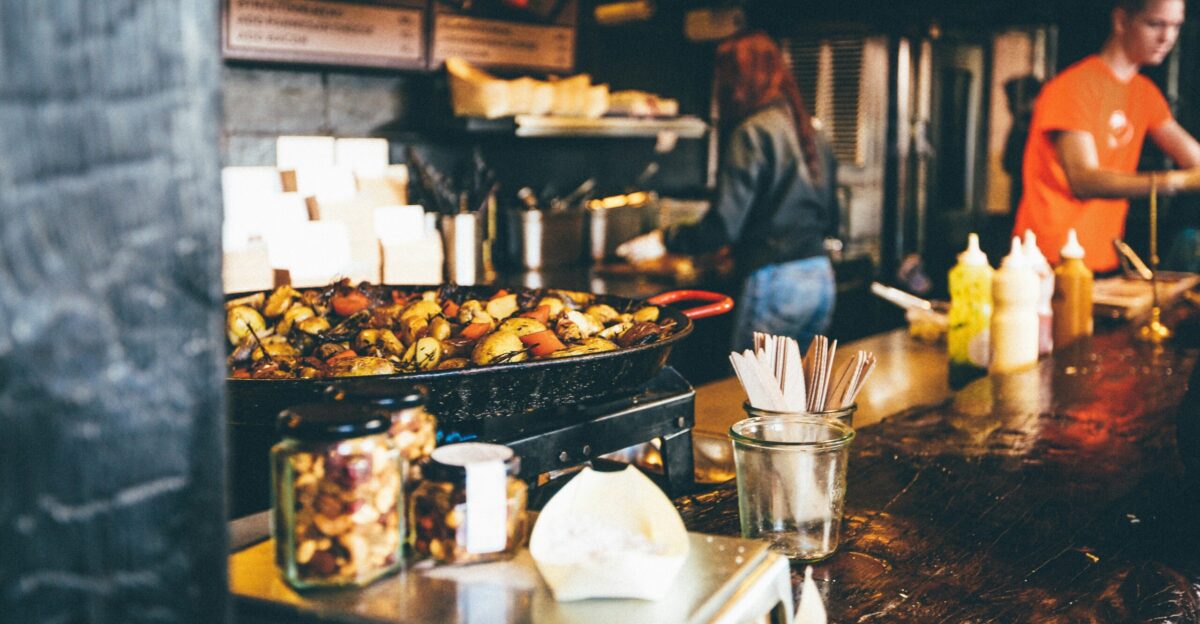 person in the kitchen cooking