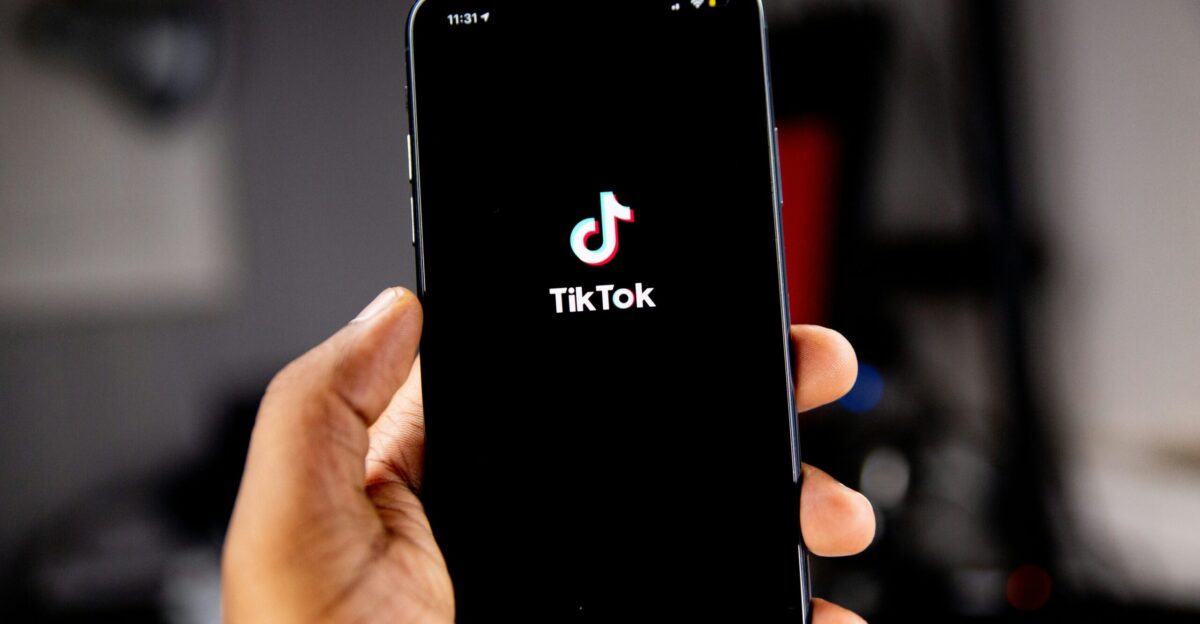 person holding black iphone 5