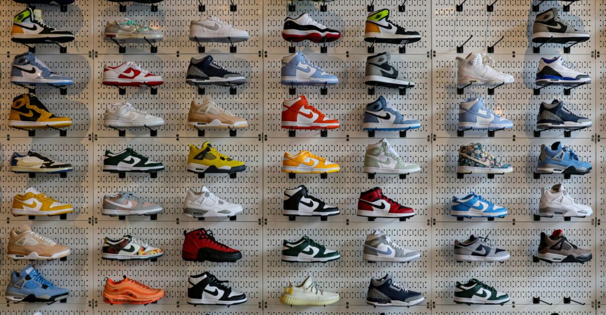 a display of various shoes on a wall