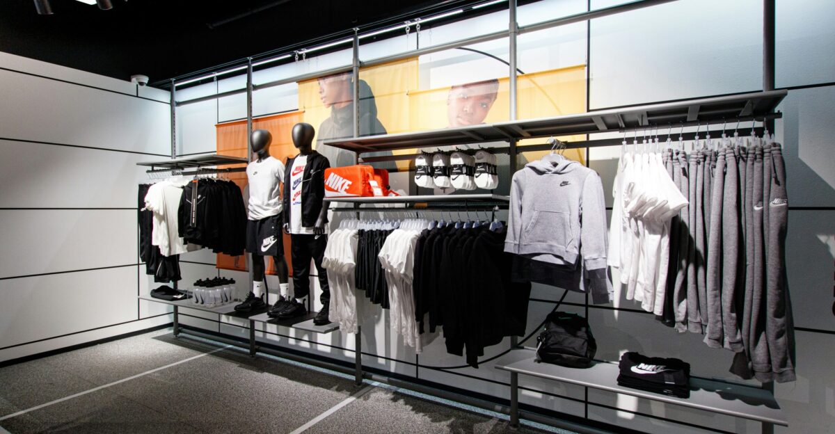 a display case with a variety of clothing on display