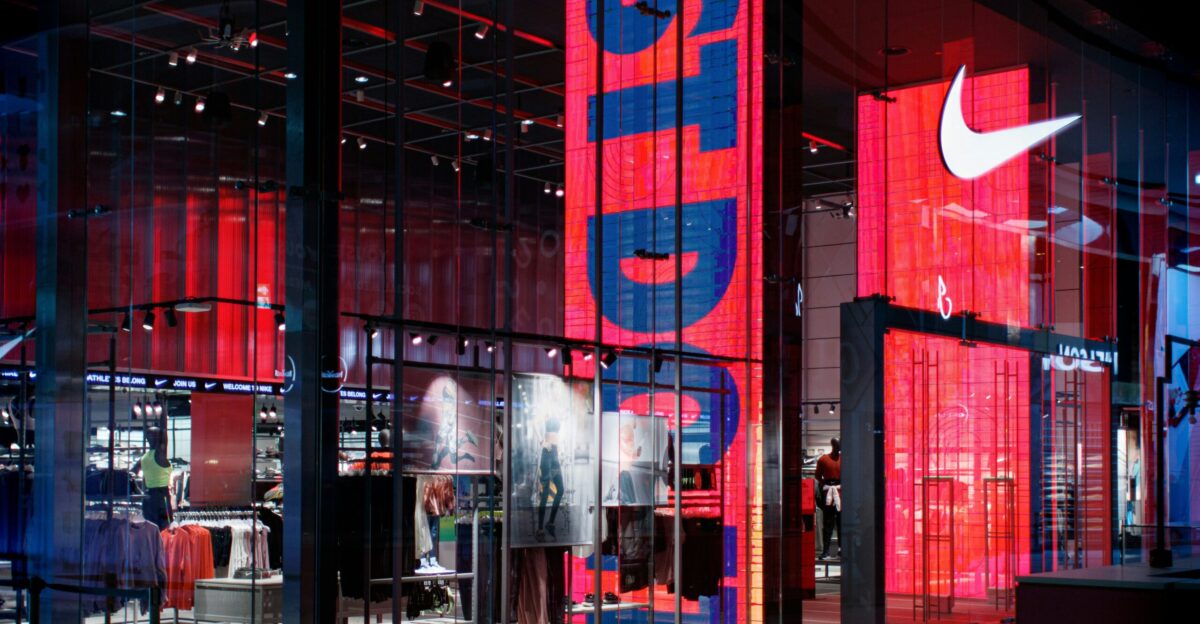 a nike store with red and blue lighting