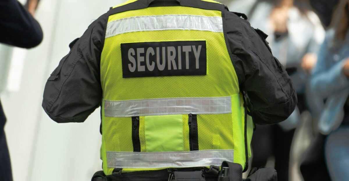 a security officer walking down a street