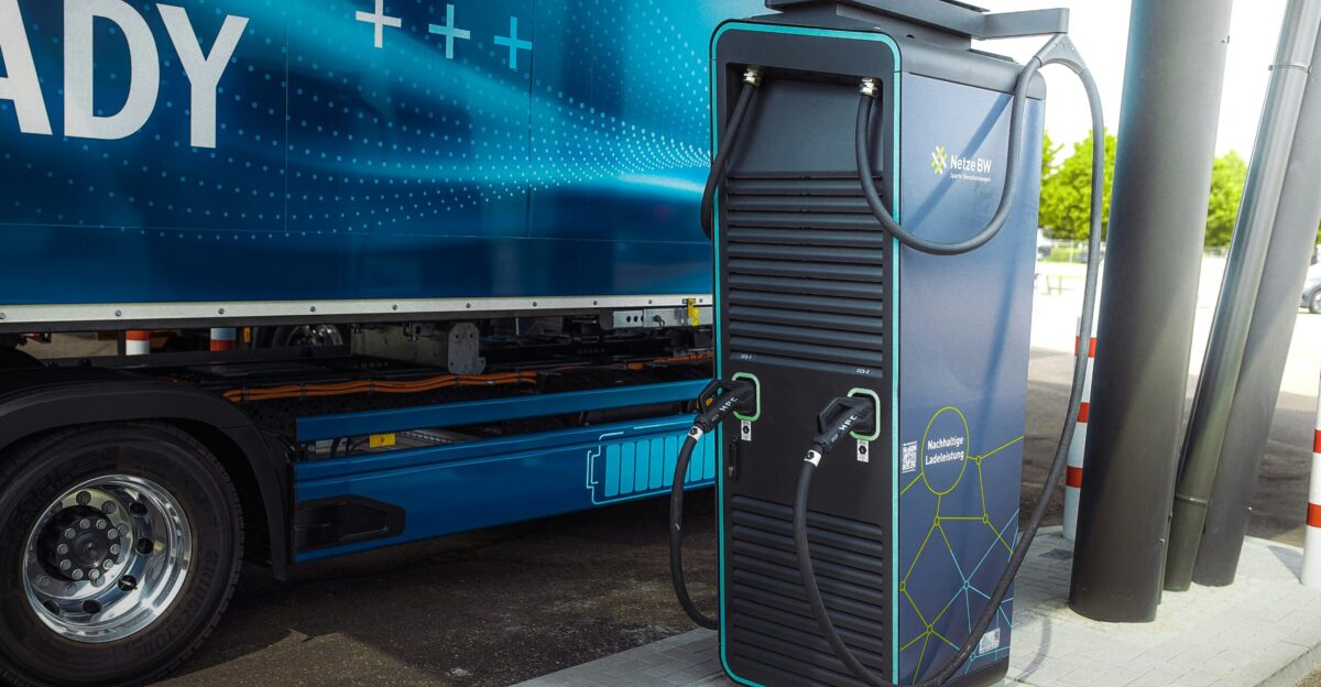 a blue truck with a door open