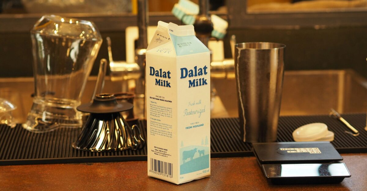 a carton of milk sitting on top of a table