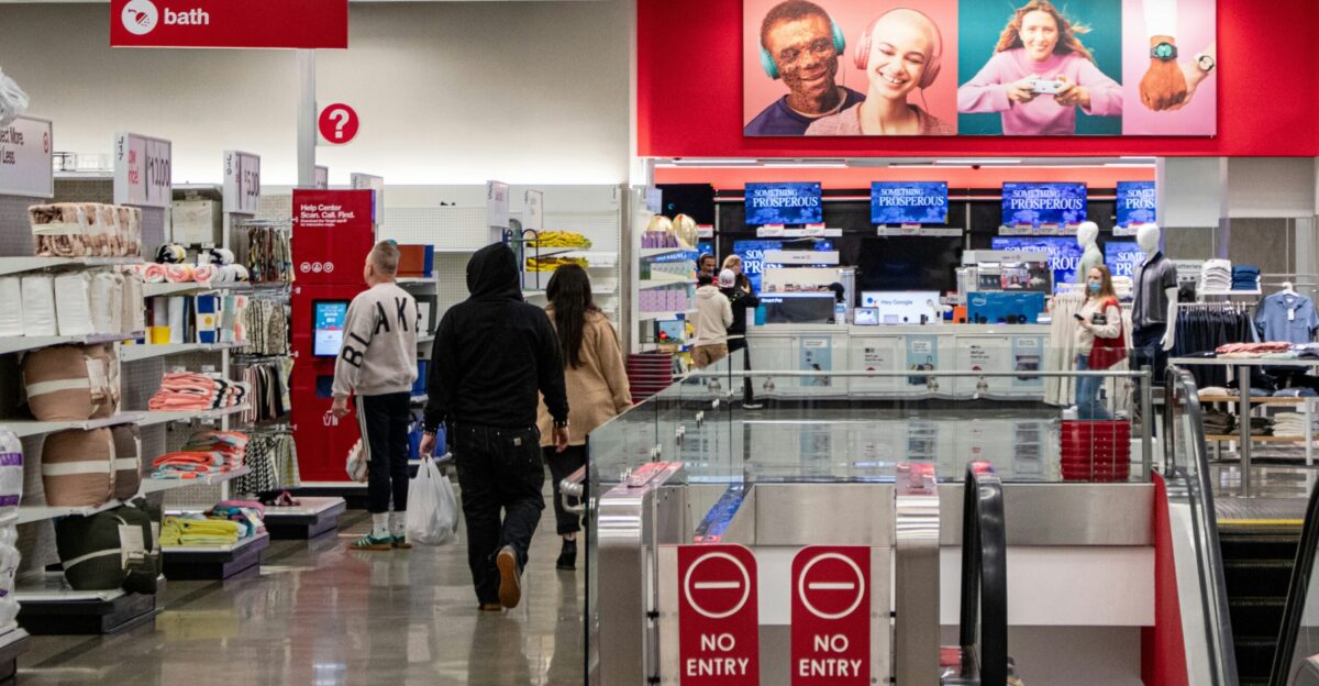 People shop in a target store aisle