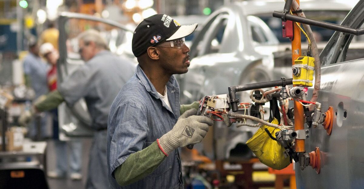 Interesting gloves and goggles - the gloves could be different for different jobs allowing dexterity for minute functions - Detroit 2010 by Jennifer Brawn Gittings