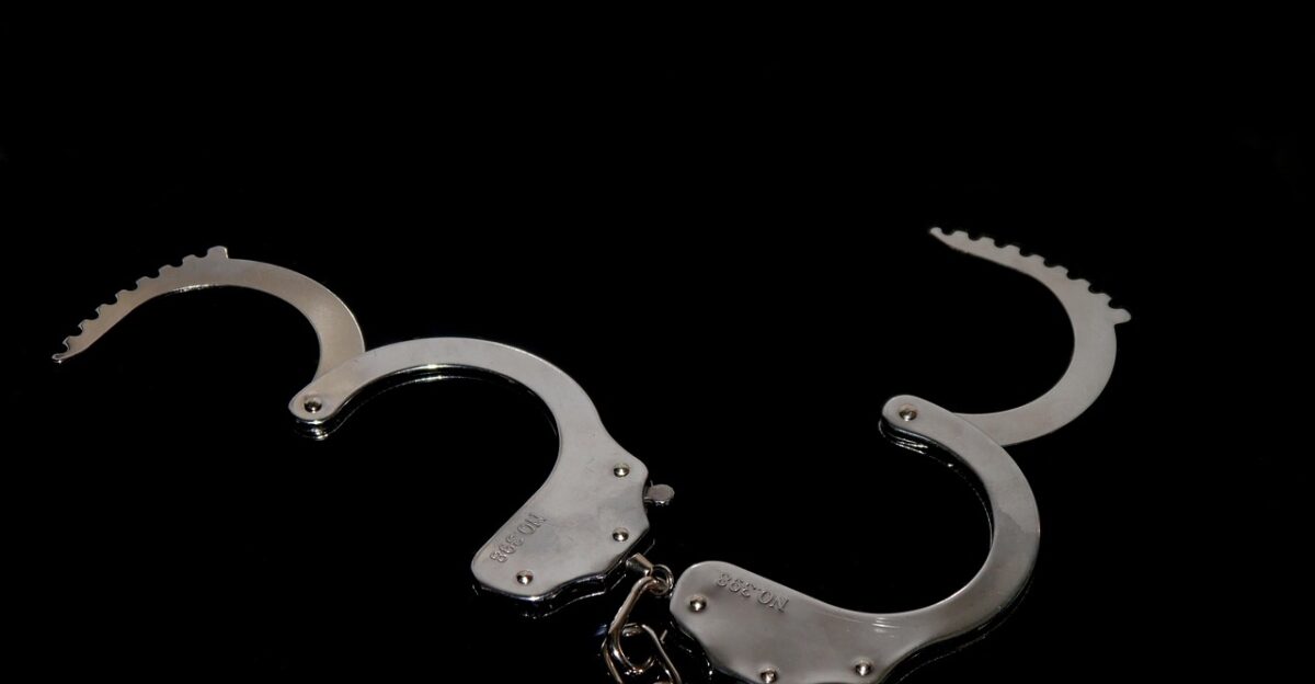 handcuff black silver caught metal stole chain handcuff handcuff handcuff handcuff handcuff caught
