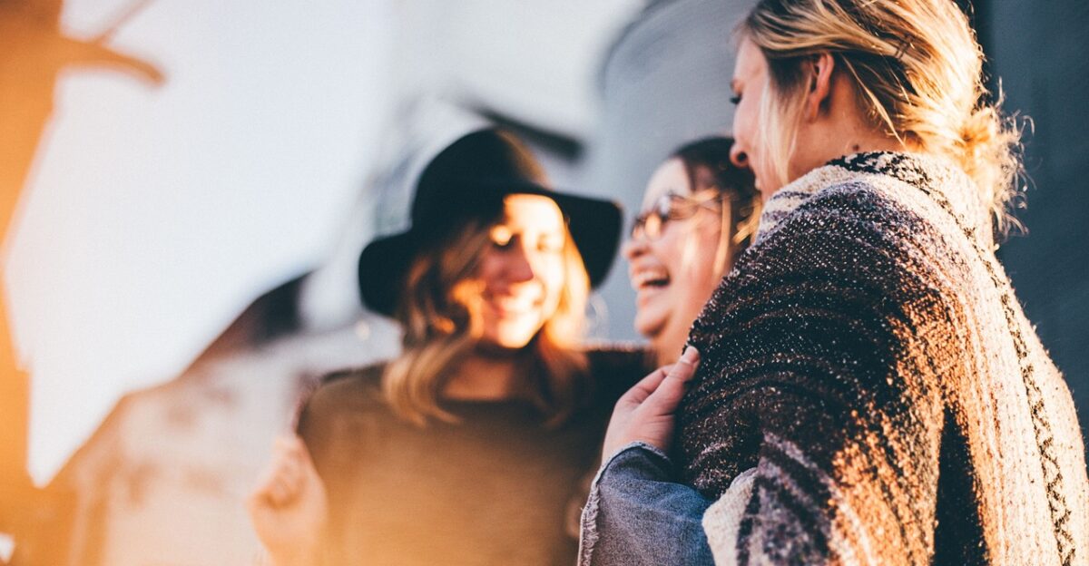 happy holidays women talking laugh happy friends casual outdoors people