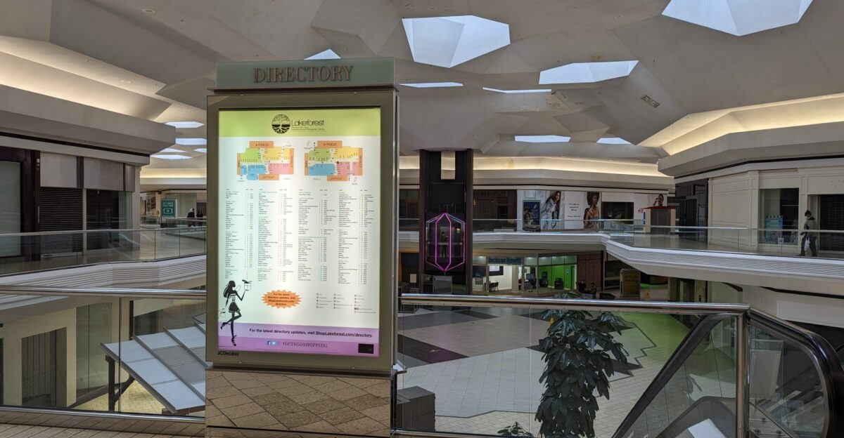 The lighted directory for Lakeforest Mall with the glass elevator and the center mall area behind it on the last day Lakeforest was open 701 Russell Avenue Gaithersburg Maryland