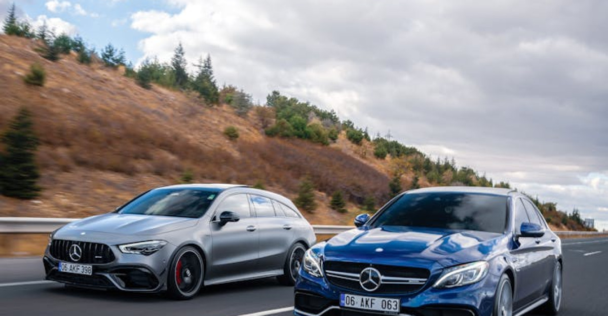Dynamic shot of two Mercedes-Benz cars racing on a highway near Ankara T rkiye