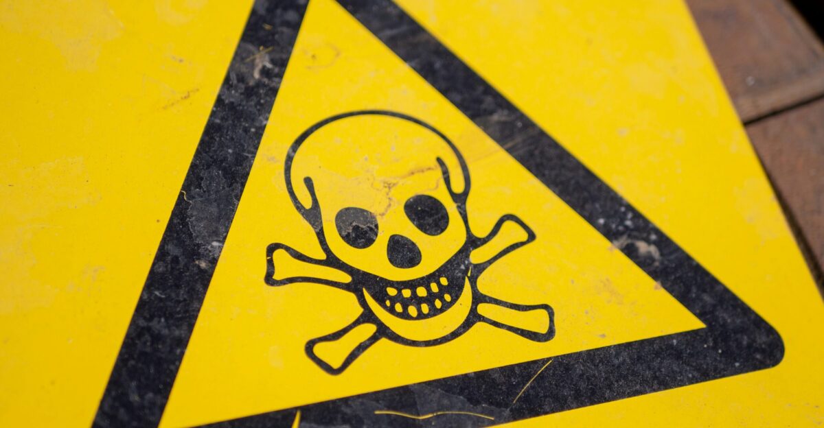 black and yellow poison sign
