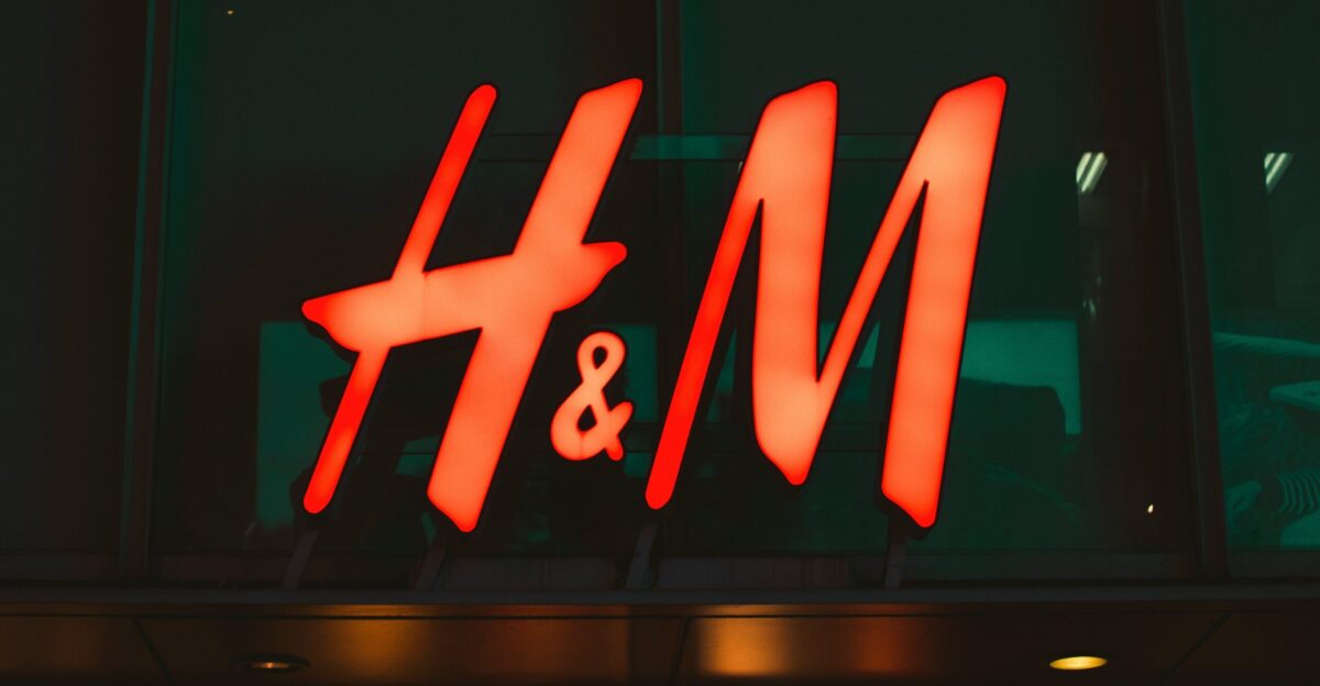 H M neon signage