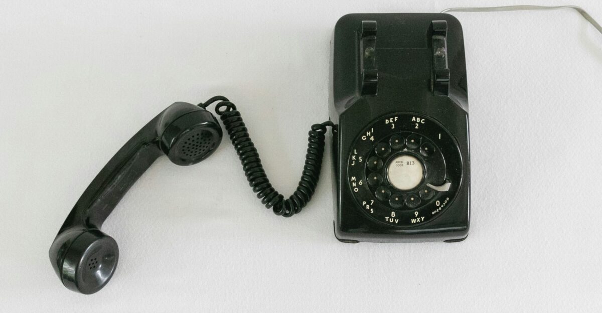 black and silver rotary phone