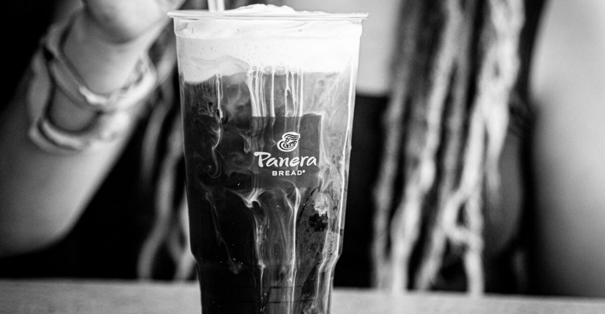 grayscale photo of clear drinking glass