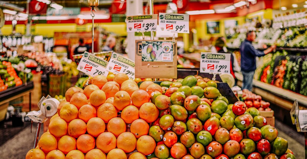red and green apples on fruit stand