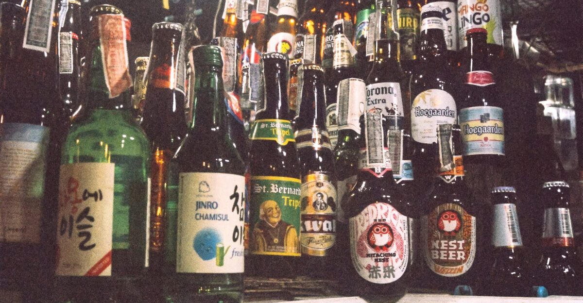 six bottles on black table