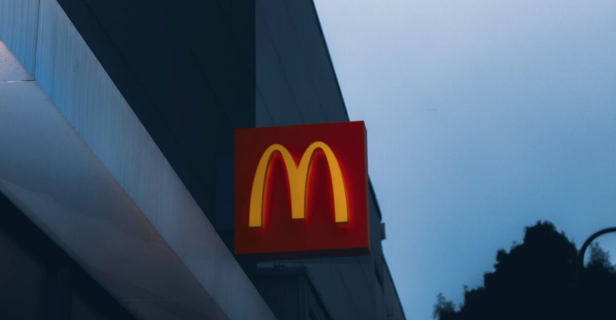 a close up of a mcdonald s sign on a building