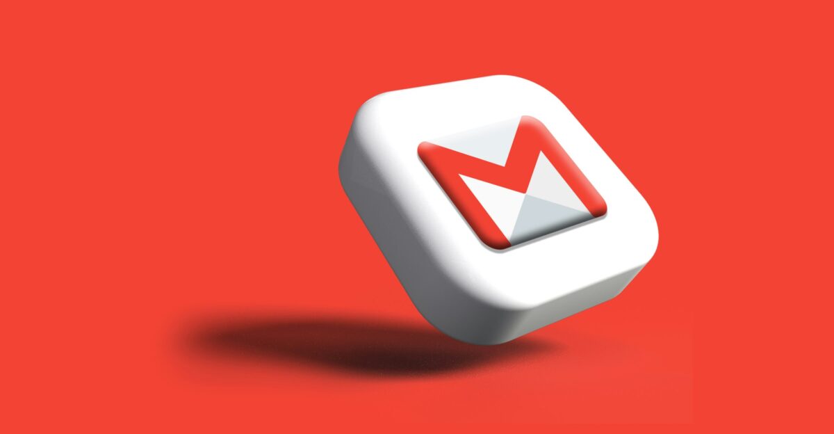 a close up of a white and red object on a red background