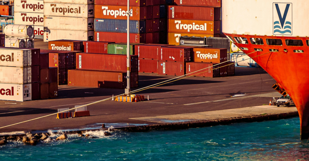 a large cargo ship docked in a harbor