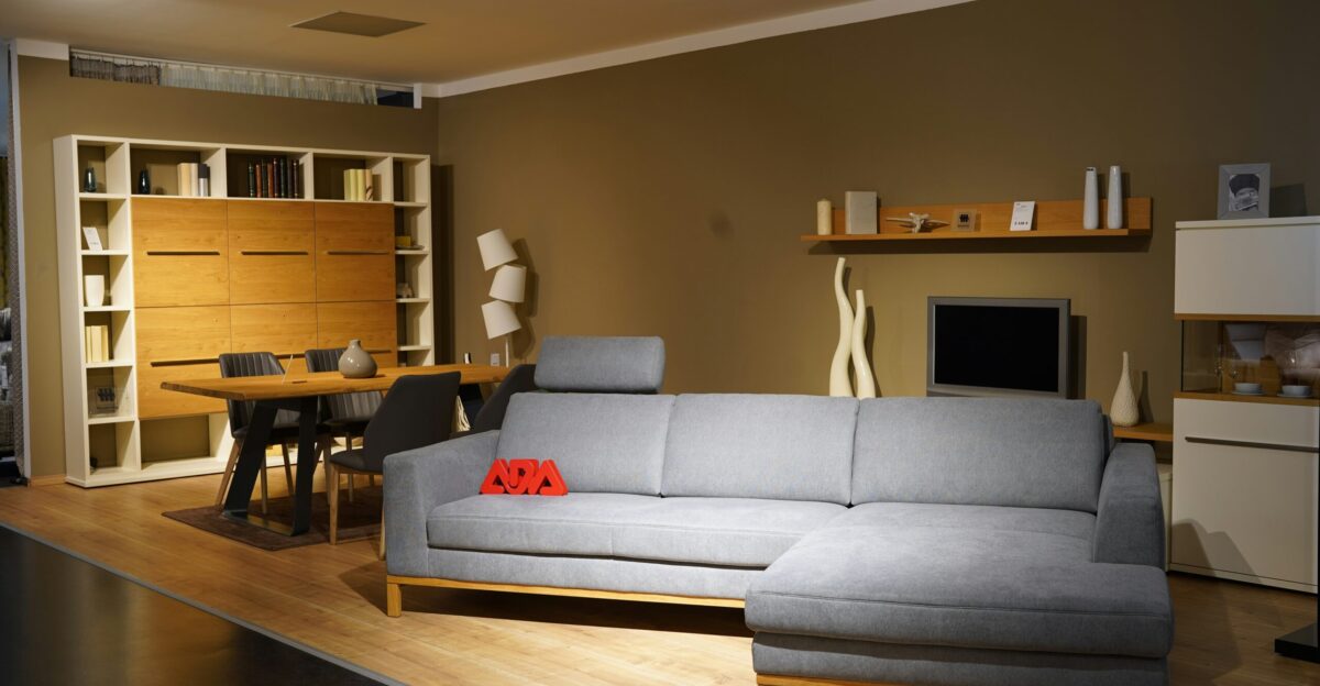 a living room filled with furniture and a flat screen tv