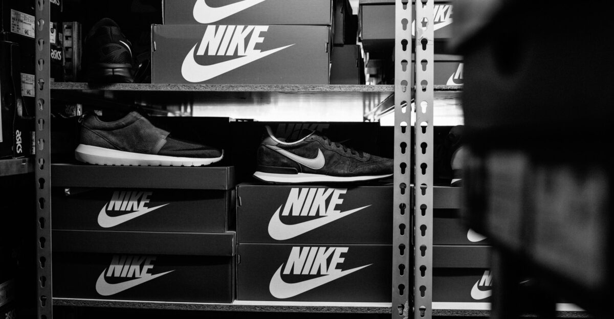 a black and white photo of a pair of nike shoes