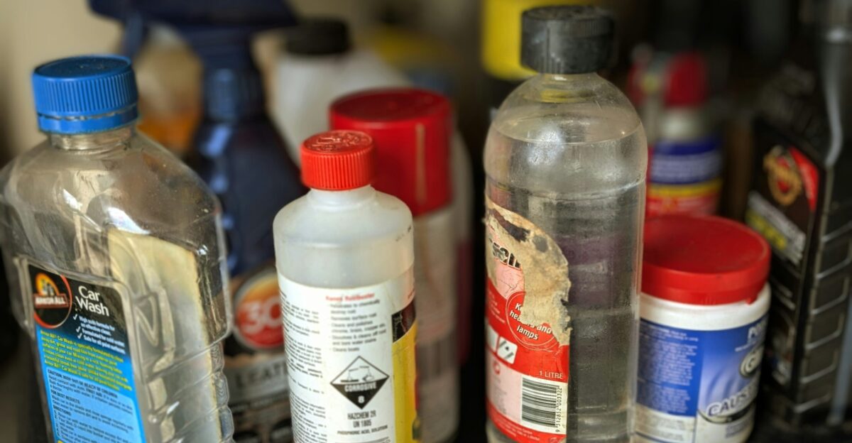 A bunch of bottles are sitting on a shelf
