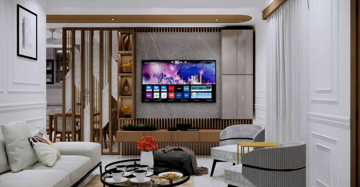 A living room filled with furniture and a flat screen TV
