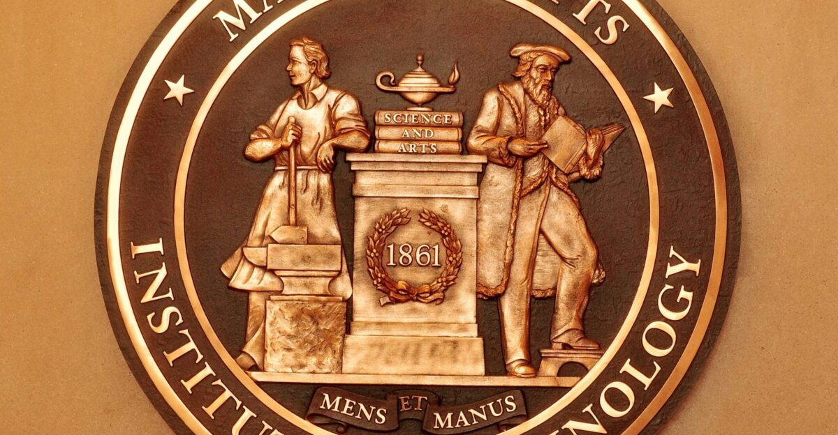 The massachusetts state seal on the wall of a building