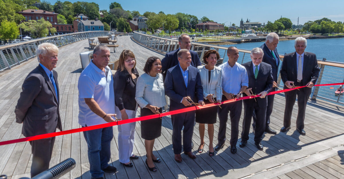 Sabina Matos Rep David Cicilline Gov Gina Raimondo Mayor Jorge Elorza Sen Jack Reed and others cut the ribbon to open the new Providence Pedestrian Bridge